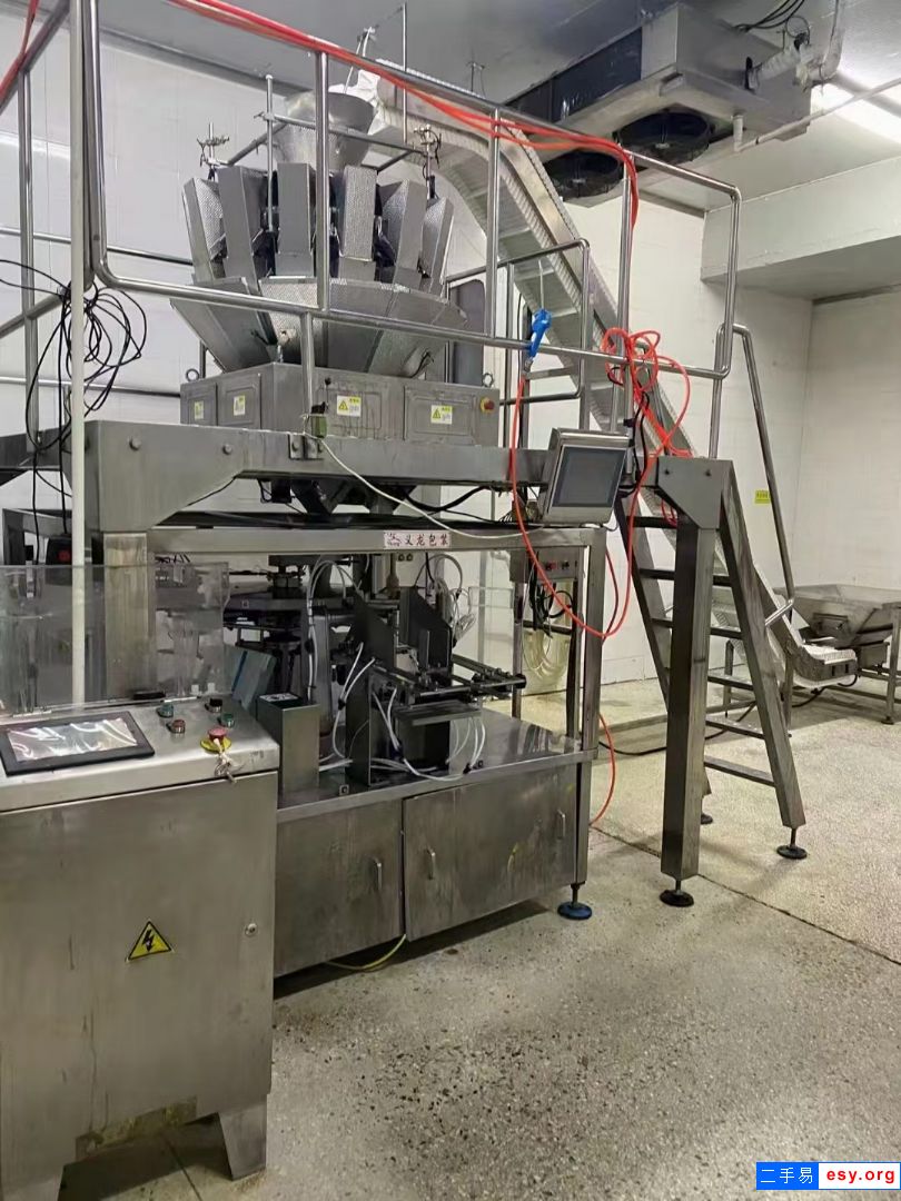 出售全自動青島義龍包裝機，十四頭組合稱，爬坡上料機 有需要的聯(lián)系聯(lián)系我