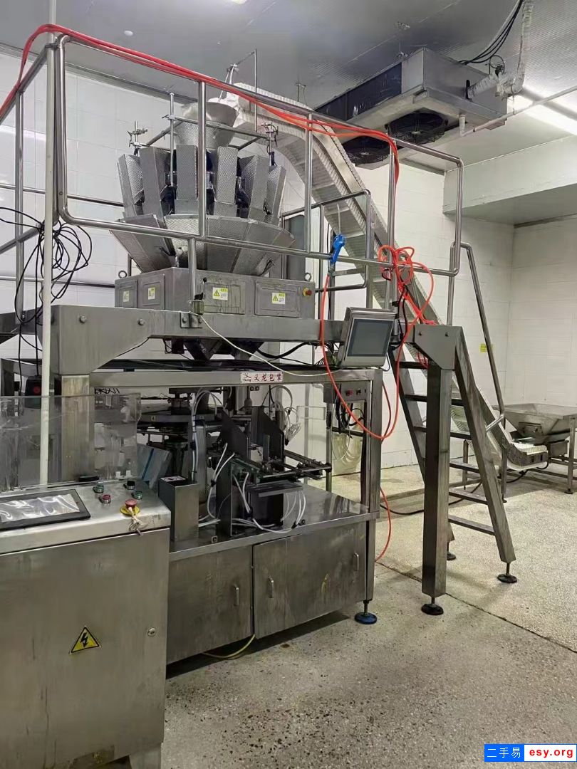 出售全自動青島義龍包裝機，十四頭組合稱，爬坡上料機 有需要的聯(lián)系聯(lián)系我
