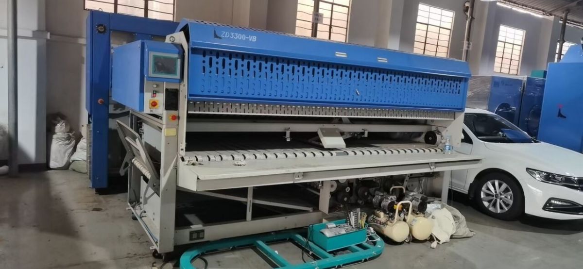 出售二手海獅展布機(jī) 高速燙平機(jī) 高速折疊機(jī)