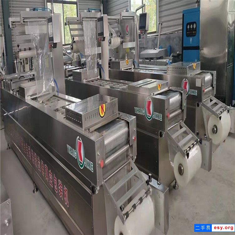出售二手大米6面整形真空包裝機(jī)1000型滾動(dòng)式包裝機(jī)億康拉伸膜包裝機(jī)