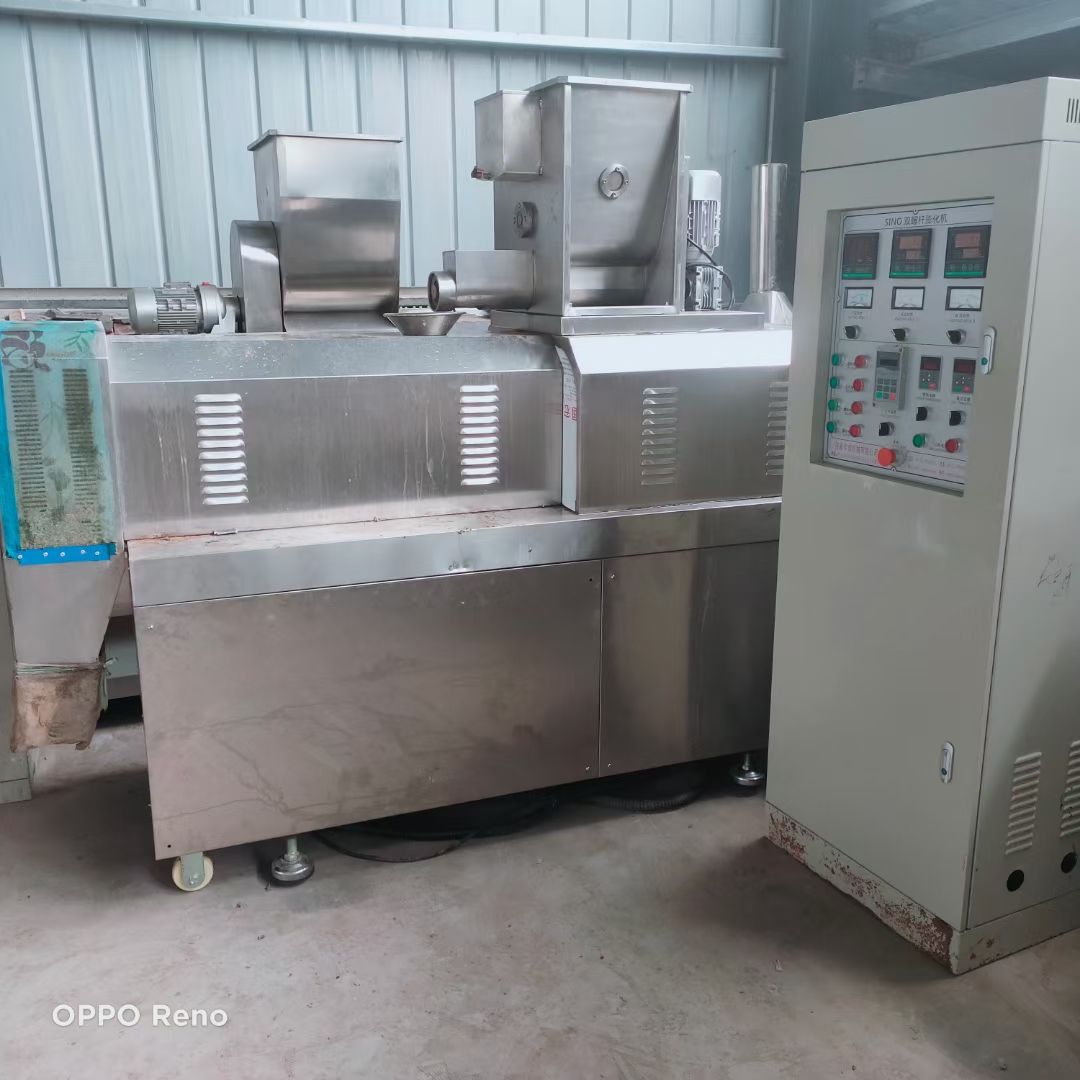 出售二手狗糧膨化機(jī) 雙螺桿膨化機(jī) 休閑食品不銹鋼膨化機(jī)整套設(shè)備