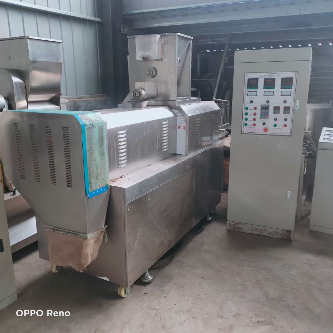 出售二手狗糧膨化機(jī) 雙螺桿膨化機(jī) 休閑食品不銹鋼膨化機(jī)整套設(shè)備
