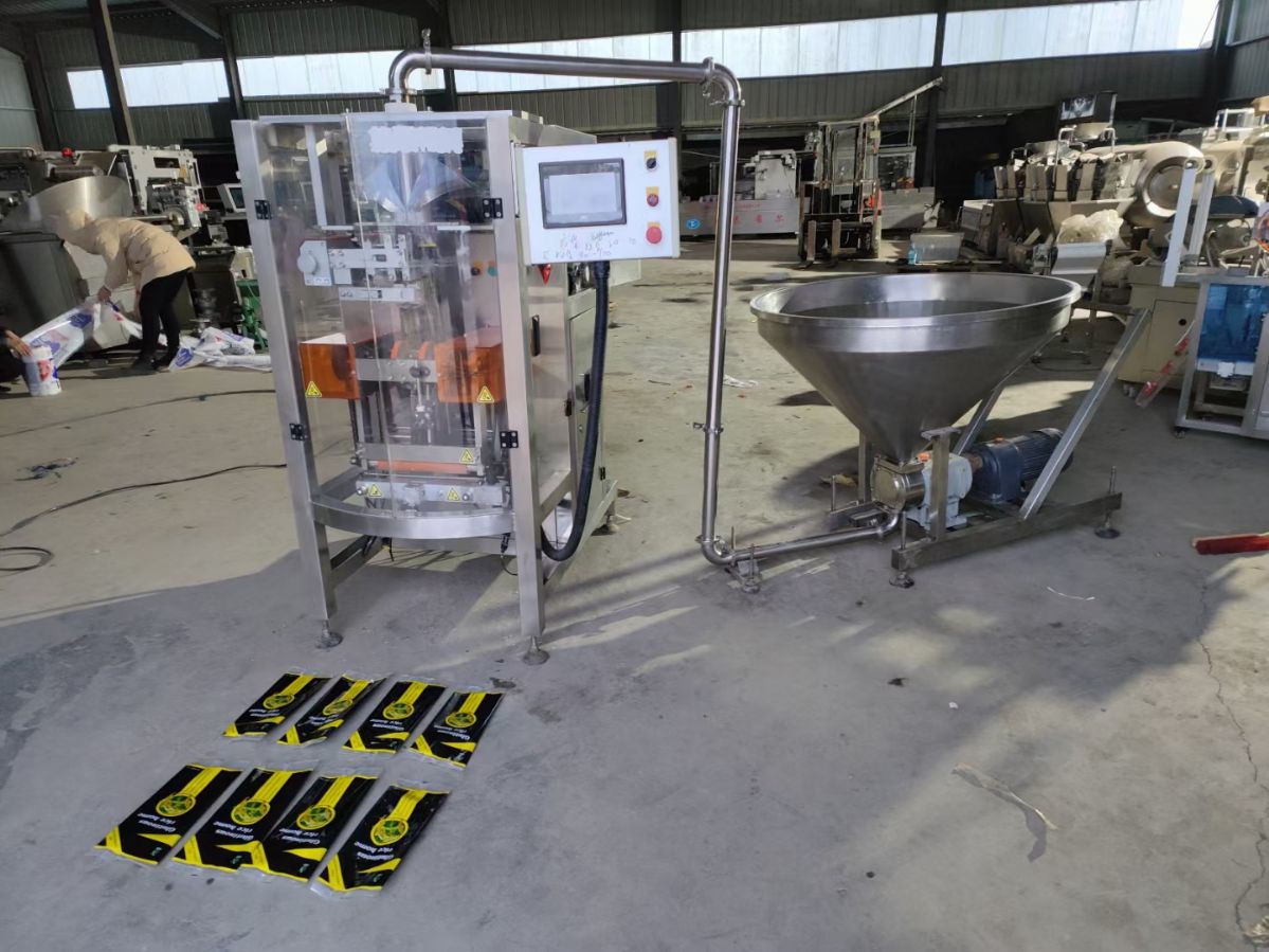 轉(zhuǎn)讓二手糯米膠膏體自動包裝機 立式醬料包裝機 粉劑稱重包裝機