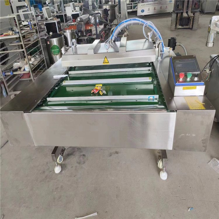 出售99成新110型食品滾動(dòng)式真空包裝機(jī)板栗多頭秤稱重給袋式真空包裝機(jī)