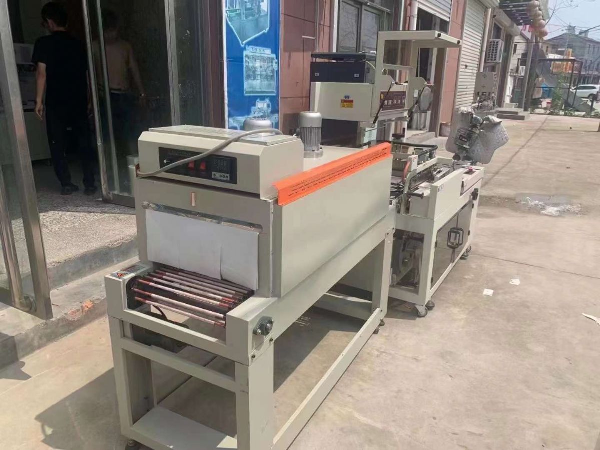 轉(zhuǎn)讓二手封切機(jī) 一套450型全自動(dòng)帶熱收縮L型封切機(jī)