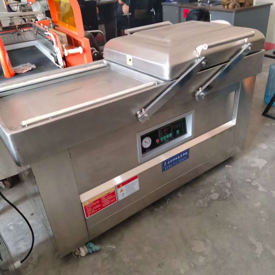 轉(zhuǎn)讓二手真空包裝機(jī) 兩臺(tái)600型雙室凹槽真空包裝機(jī)