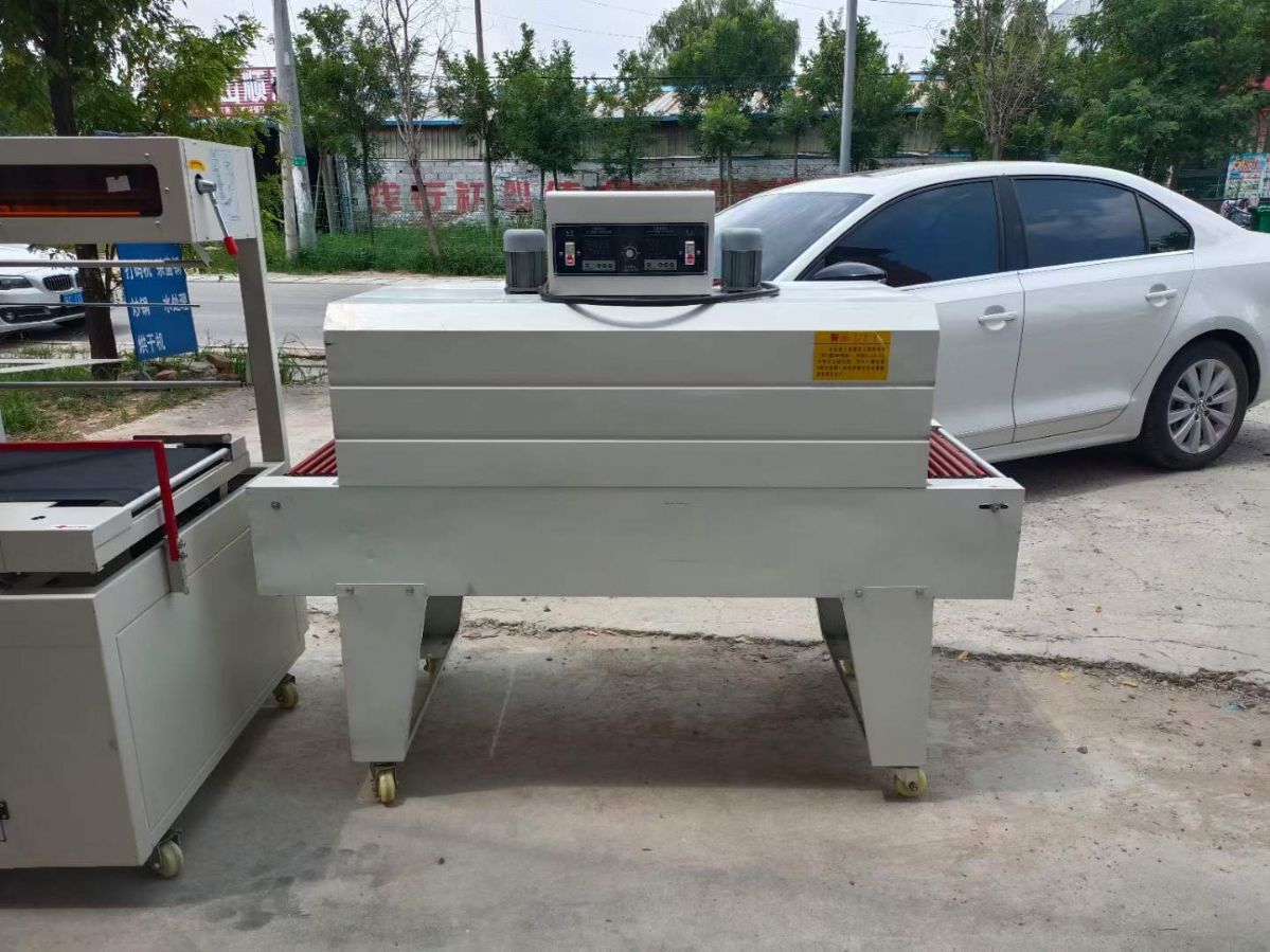轉(zhuǎn)讓二手封切機(jī) 一臺(tái)450型帶熱收縮L型封切機(jī)