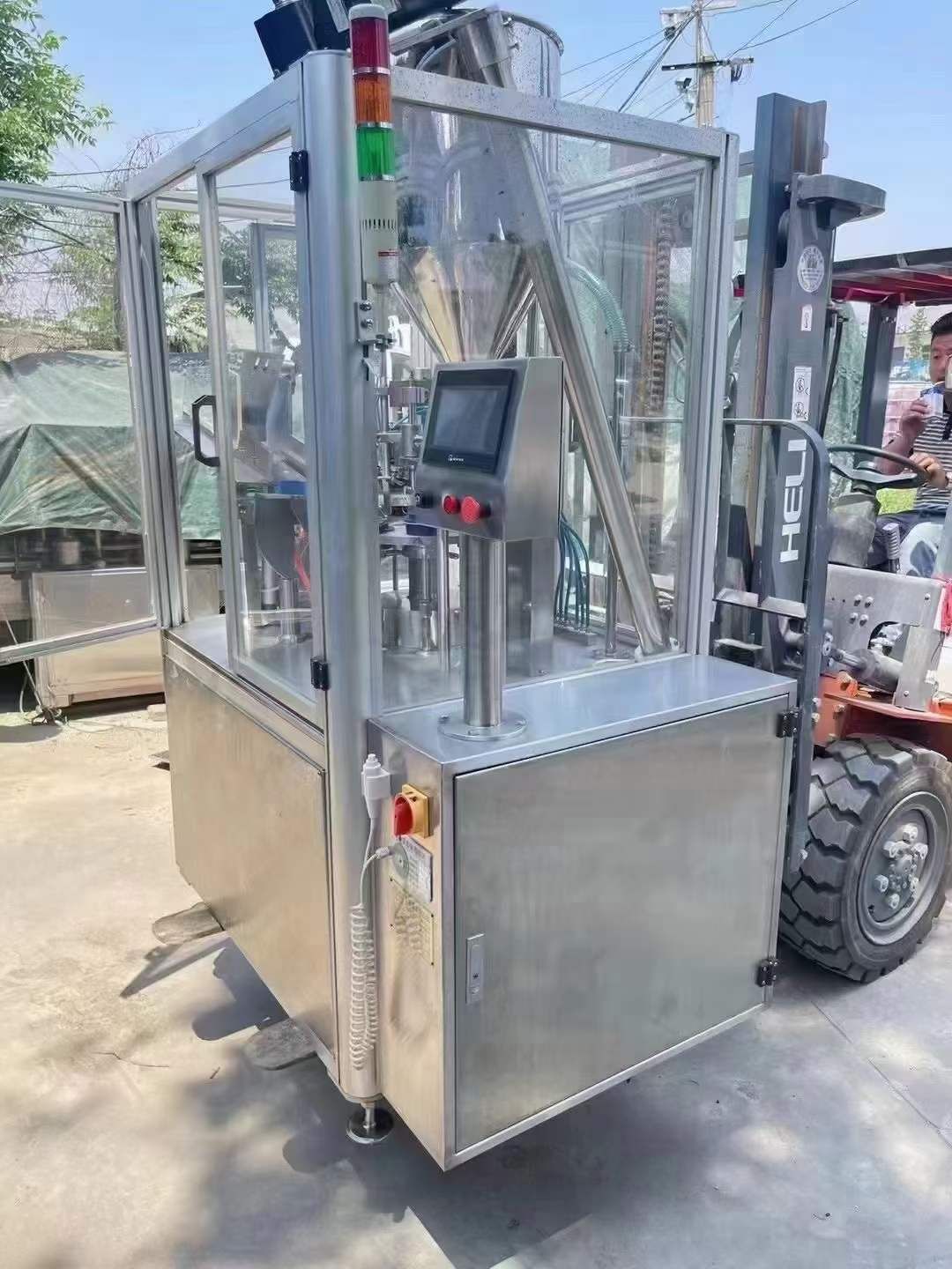 轉讓二手軟尾灌裝機 一臺罐裝范圍3-60克每分鐘40支軟尾灌裝機