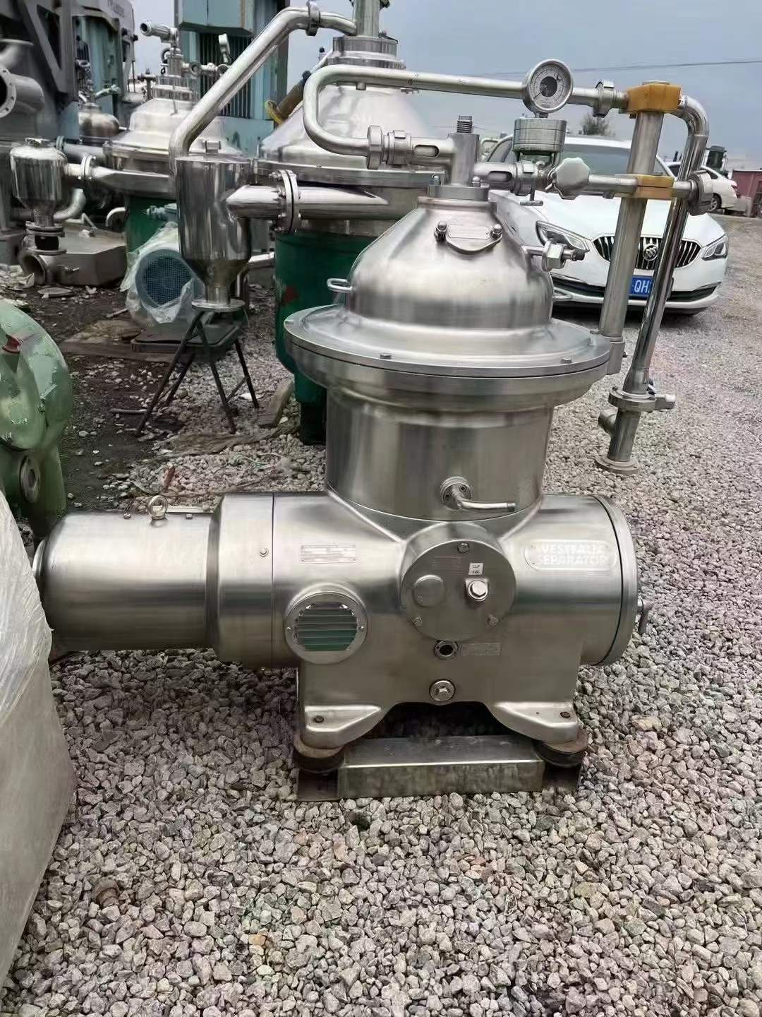 轉(zhuǎn)讓二手蝶式分離機(jī) 每小時(shí)產(chǎn)2噸韋斯伐利亞牛奶凈乳機(jī)