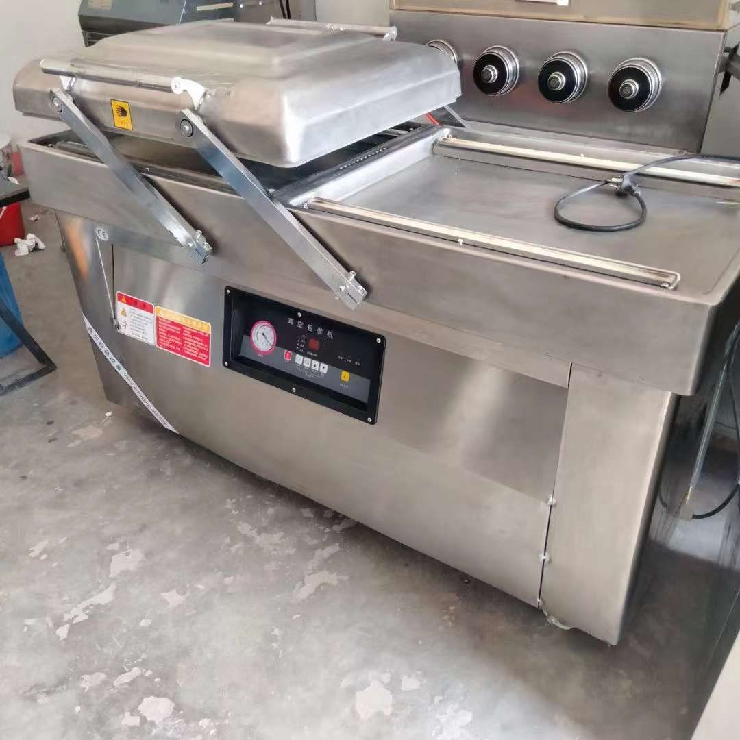 轉(zhuǎn)讓二手真空包裝機(jī) 兩臺(tái)600型雙室凹槽真空包裝機(jī)