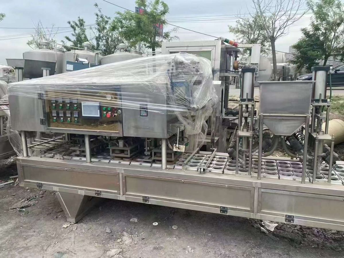 轉(zhuǎn)讓二手口杯灌裝機(jī) 兩臺(tái)一排4口32口徑口杯灌裝機(jī)
