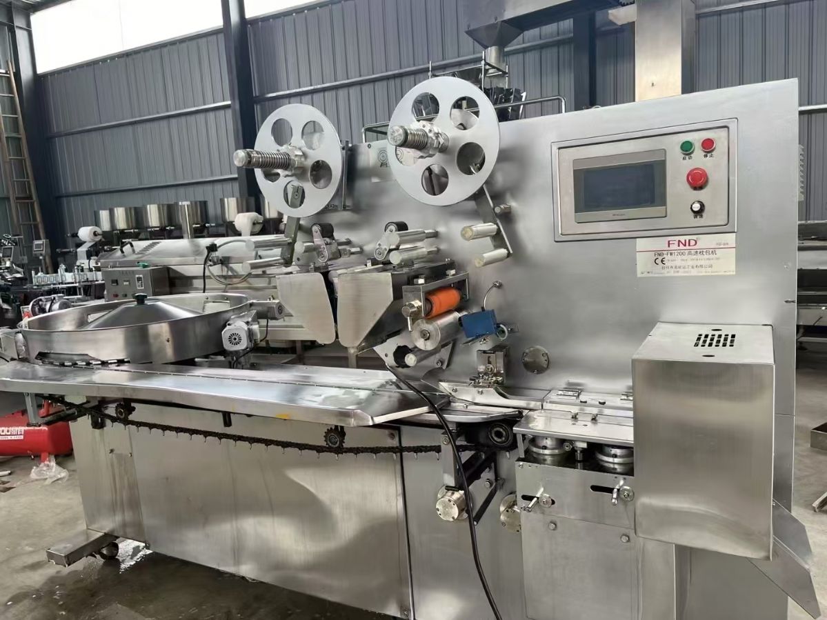 轉讓二手糖果包裝機 一臺1200型理料盤全自動糖果包裝機