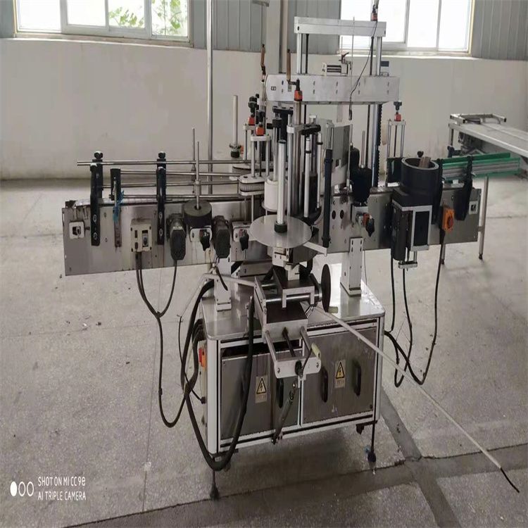 轉(zhuǎn)讓二手單面雙面圓瓶不干膠貼標(biāo)機(jī)自動(dòng)定位