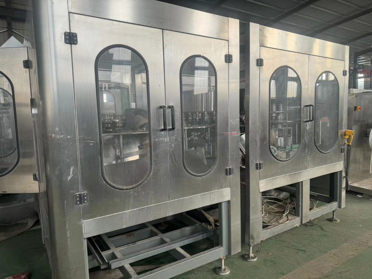 轉讓多臺二手飲料果汁礦泉水啤酒灌裝機、套標機、吹瓶機、膜包機