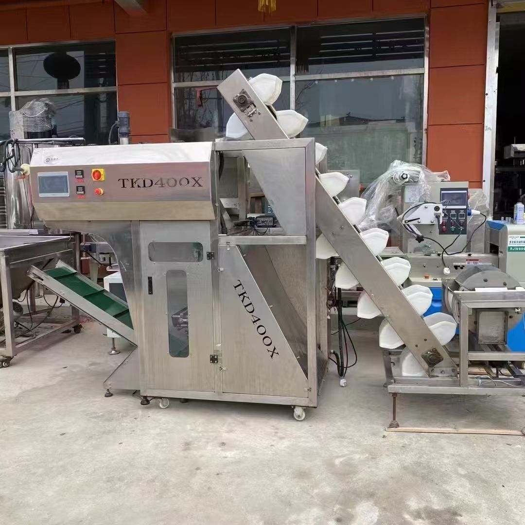 轉(zhuǎn)讓二手土豆粉包裝機(jī) 一臺400X型配帶上料機(jī)土豆粉包裝機(jī)