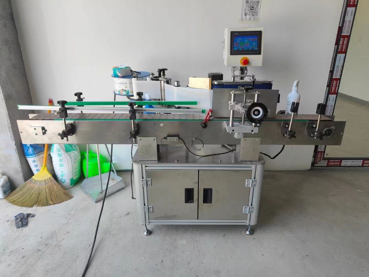 轉(zhuǎn)讓二手圓瓶貼標機 一臺搓輪式全自動圓瓶貼標機