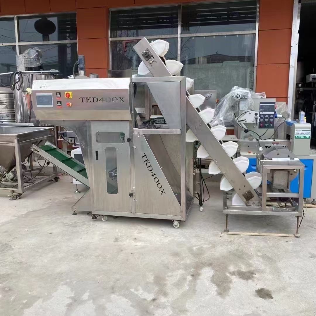 轉(zhuǎn)讓二手土豆粉包裝機(jī) 一臺400X型配帶上料機(jī)土豆粉包裝機(jī)