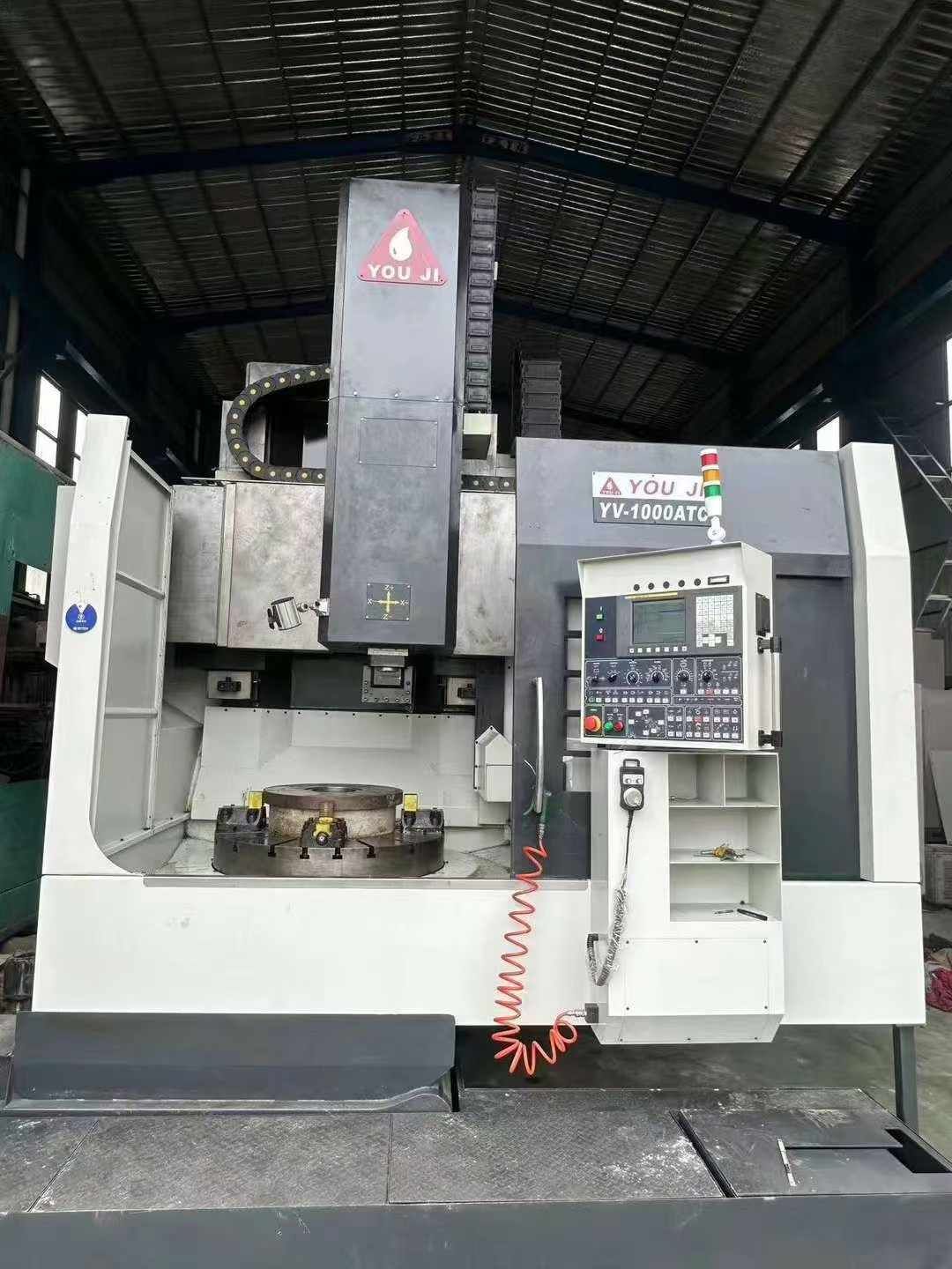 出售二手油機YV-1000ATC數(shù)控立式車床切削高度700