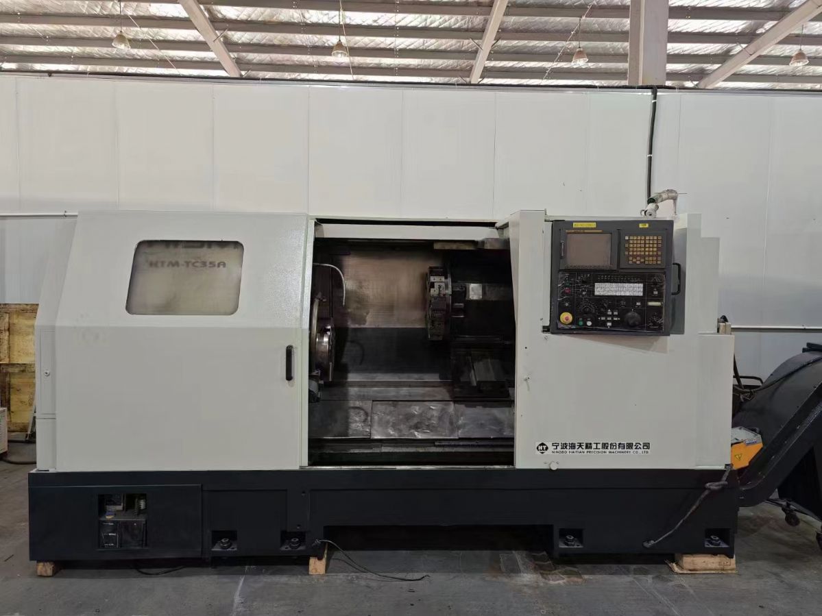 處理二手海天HTM-TC35x1000數(shù)控斜身車主電機(jī)功率18.5