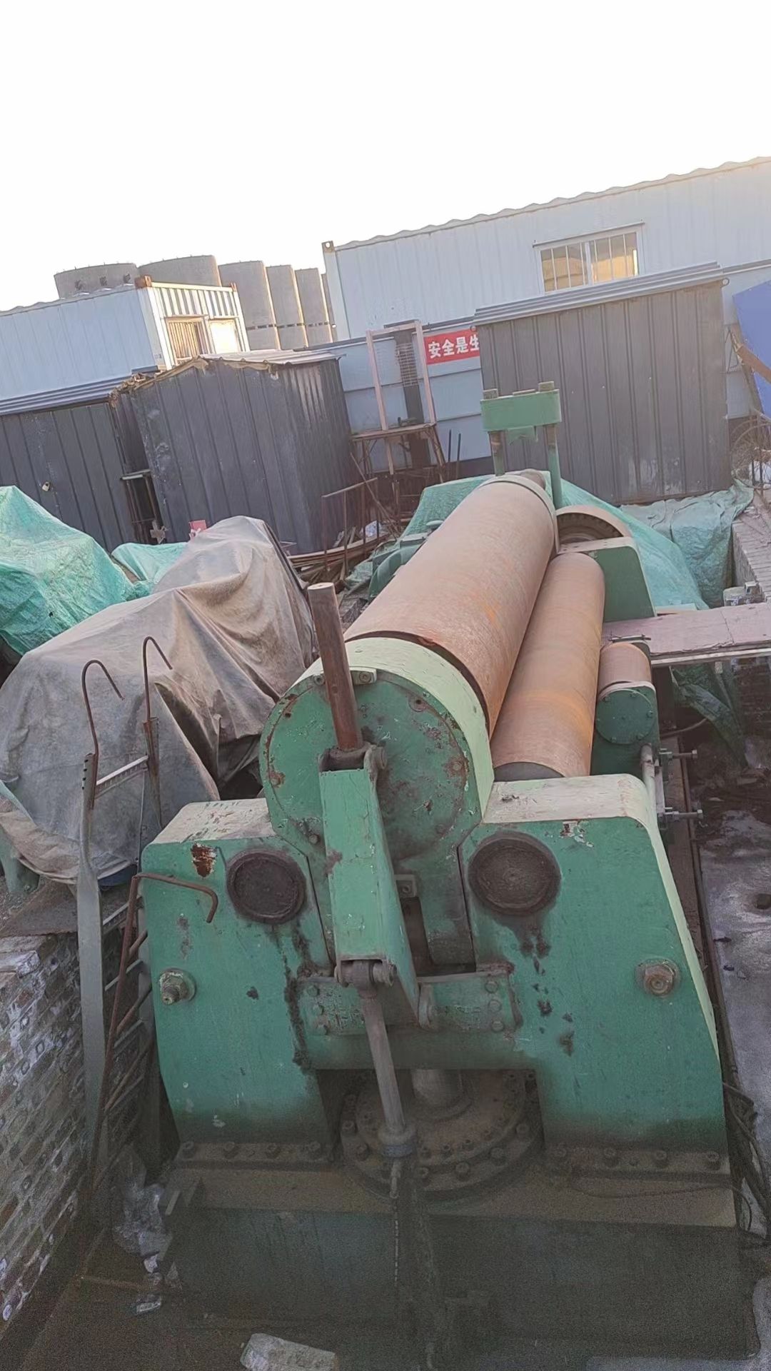 淄博联星窑业获得窑炉炉壳加工用卷板机专利添加直线电机与推杆来直接对资料进行主动下料