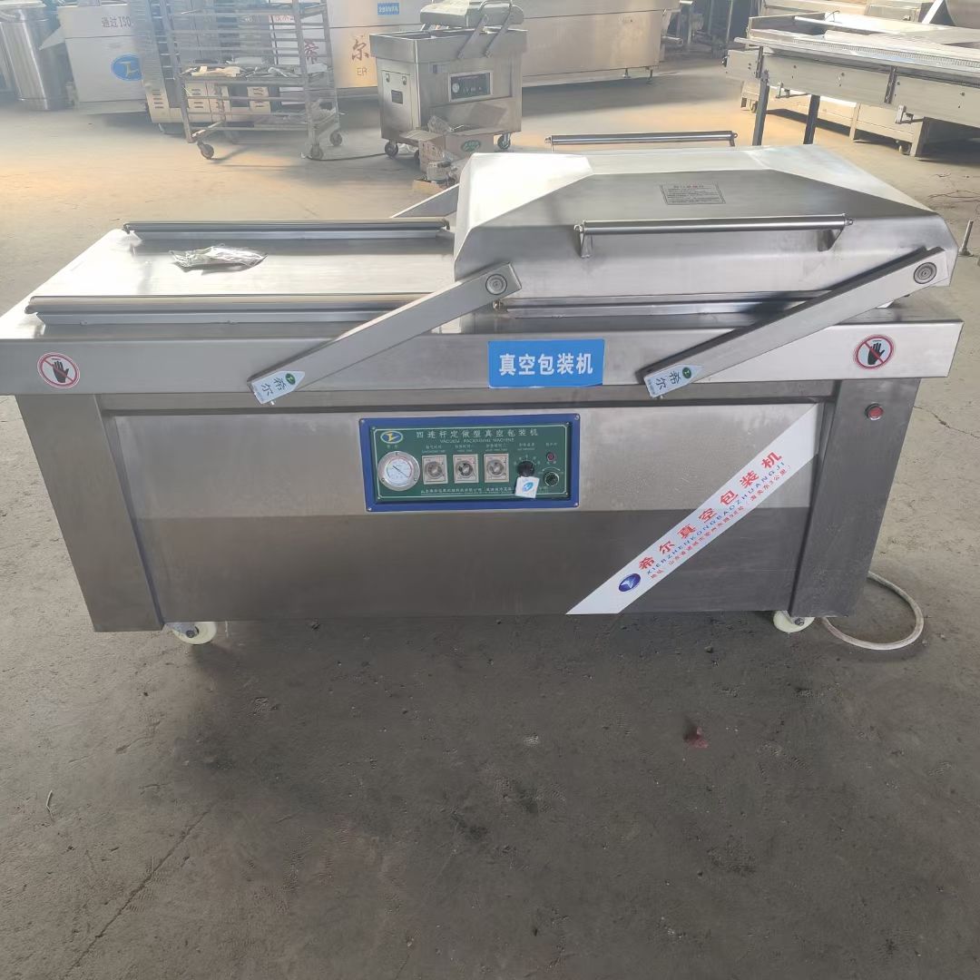 出售二手枕式包装机 700型双室真空包装机 食品滚动式真空包装机