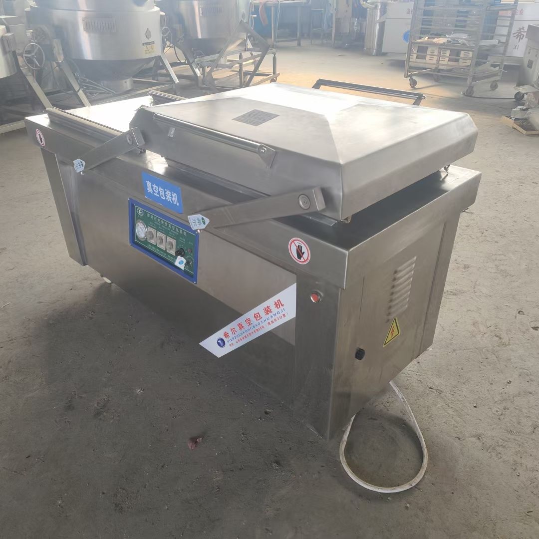 出售二手枕式包装机 700型双室真空包装机 食品滚动式真空包装机