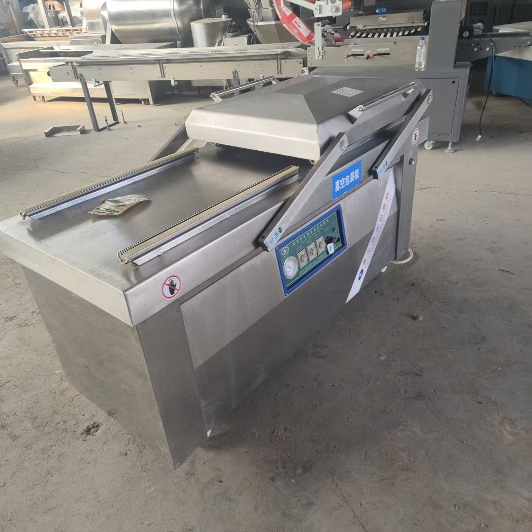 出售二手枕式包装机 700型双室真空包装机 食品滚动式真空包装机