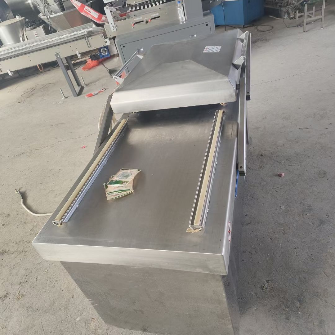 出售二手枕式包装机 700型双室真空包装机 食品滚动式真空包装机
