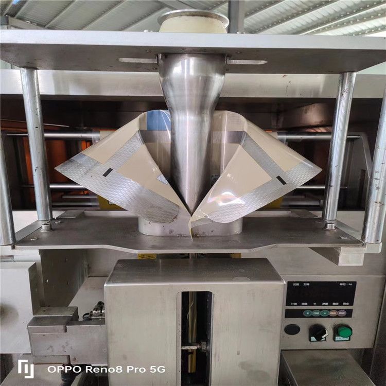 转让二手制热盒饭热缩膜枕式包装机 玉米滚动式包装机 立式液体包装机