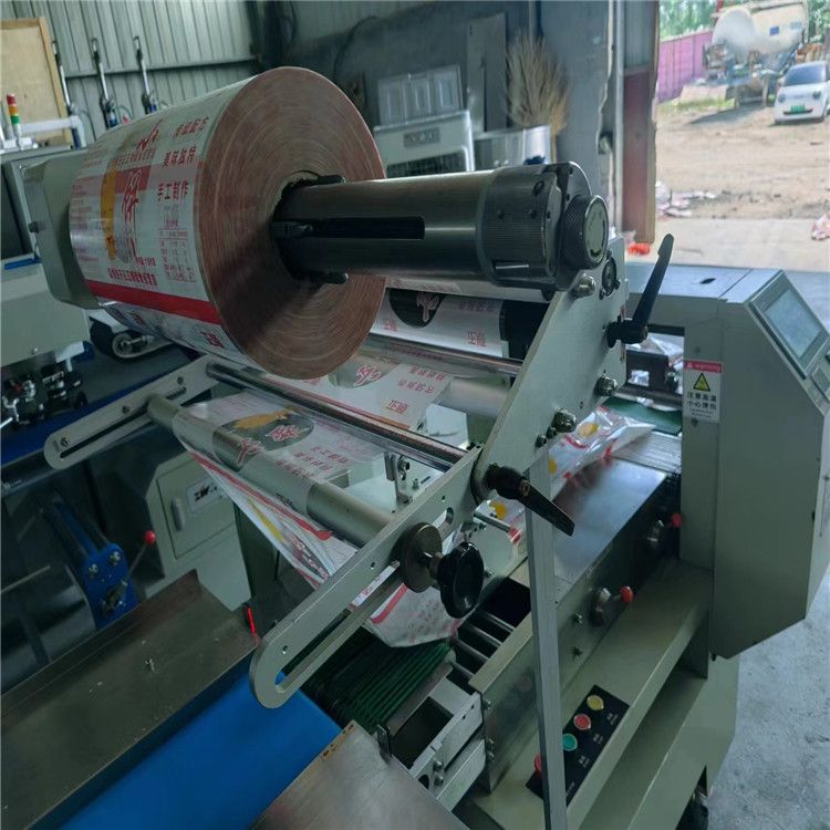 转让二手600型上走膜皮带枕式包装机 面试松川下走膜三伺服枕式包装机