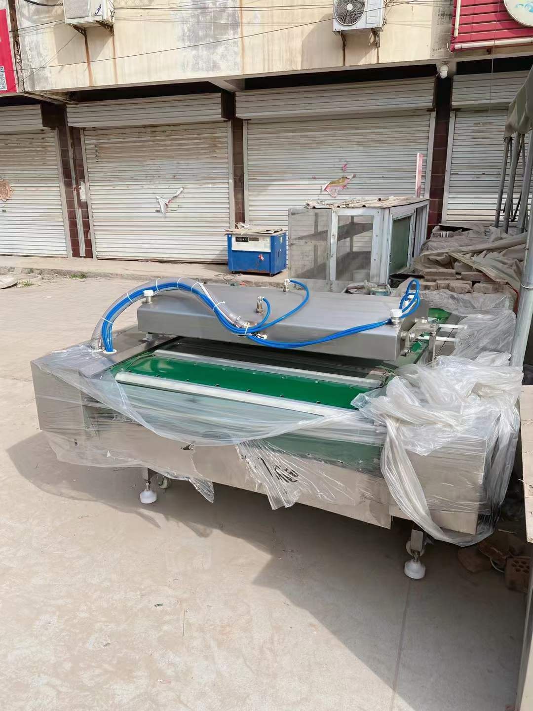 转让二手真空包装机 一台1100型滚动式真空包装机