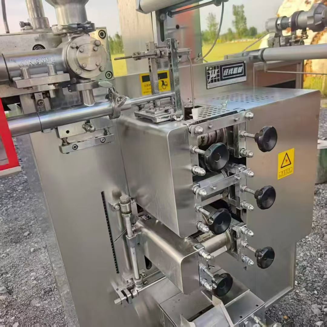 转让二手液体包装机 一台成都经纬产三边封液体酱料包装机