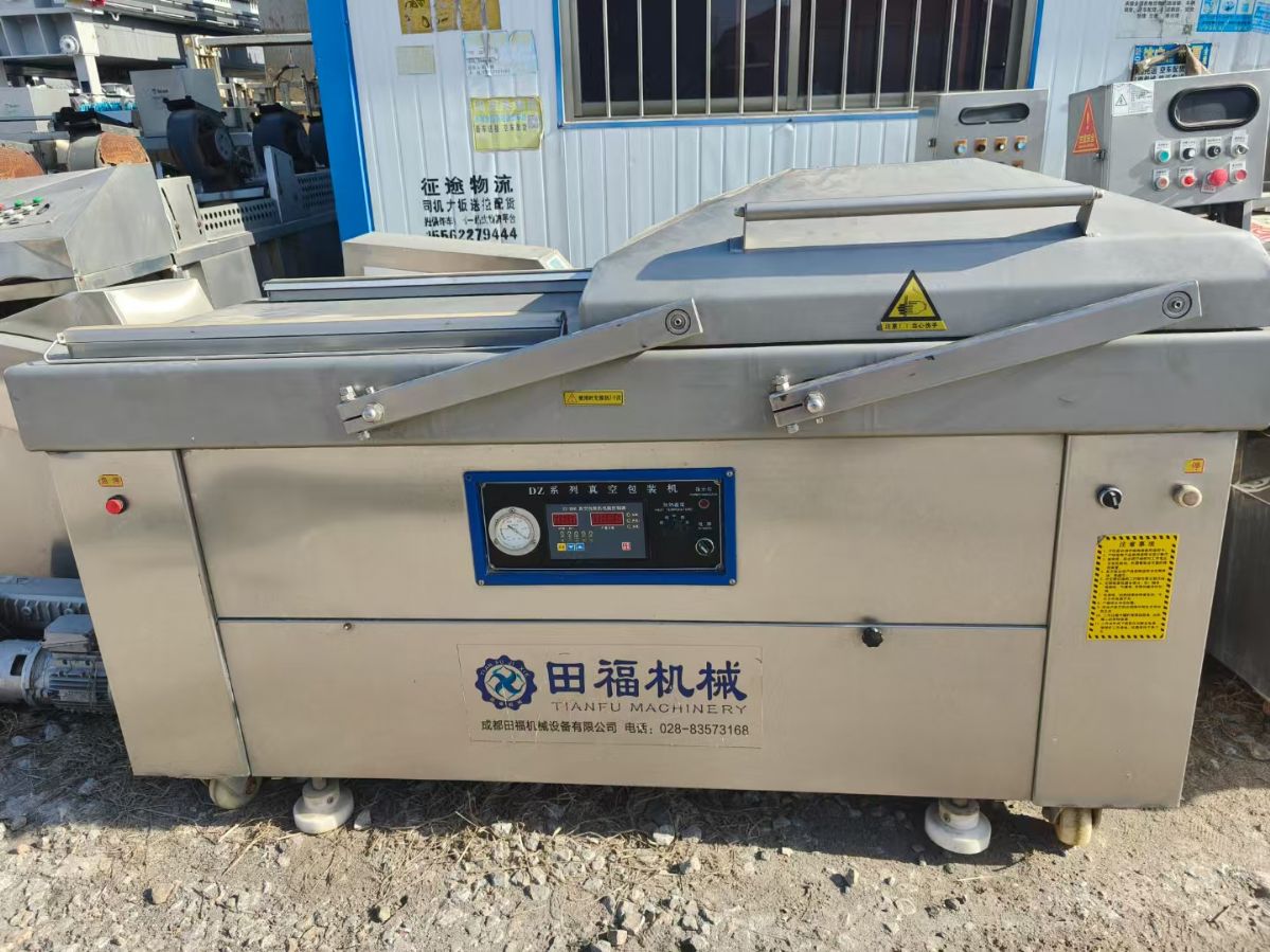 转让二手真空包装机 一台800型自动翻盖双室真空包装机