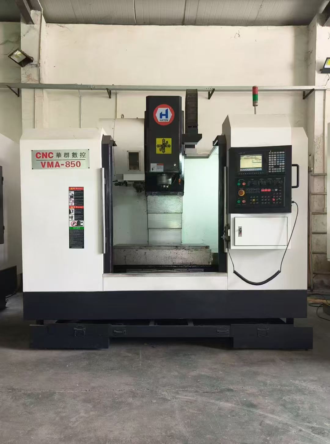 华群850三硬轨加工中心，三菱m70系统